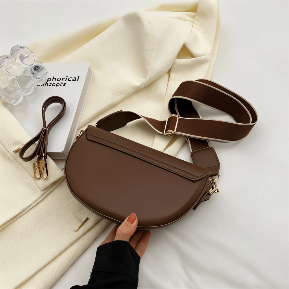 Xyline – Halbmond-Crossbody-Tasche mit Gurtband