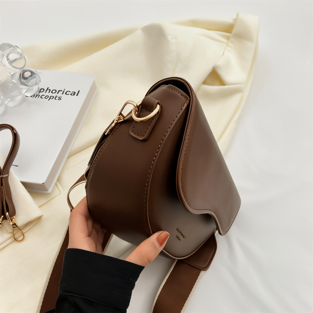 Xyline – Halbmond-Crossbody-Tasche mit Gurtband